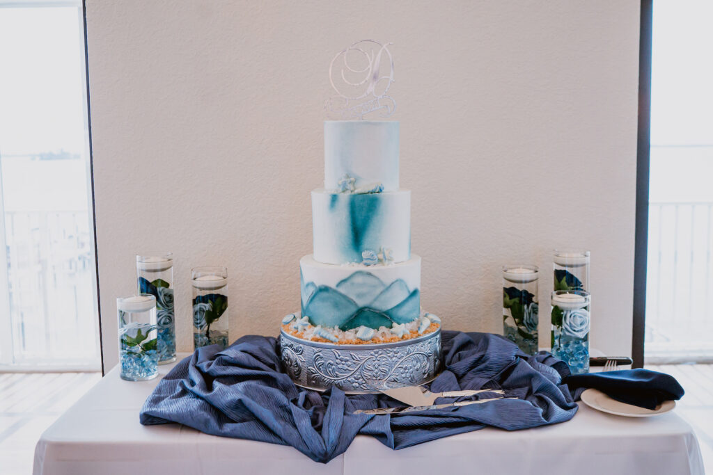 Three Tiered Wedding Cake with Blue Detailing and Ocean Inspired Ombre Design