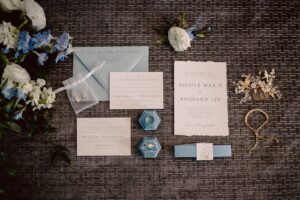 Dusty Blue Modern Wedding Invitation Flat Lay Portrait