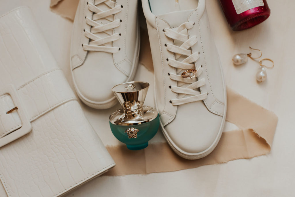 White Sneakers, Versace Perfume Bottle, Yellow Gold Oval Diamond Engagement Ring