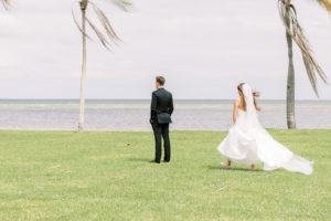Outdoor Waterfront Bride Behind Groom First Look | Tampa Bay Wedding Photographer Kera Photography