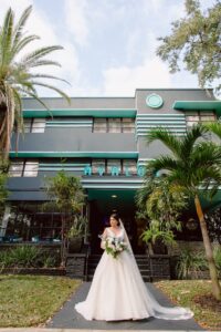 Bride with White and Dusty Blue Wedding Bouquet in Satin Ballgown Portrait | Tampa Hair and Makeup Artist Femme Akoi