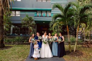 Bride with Bridesmaids in Mix and Match Blues Bridesmaid Dresses Wedding Portrait