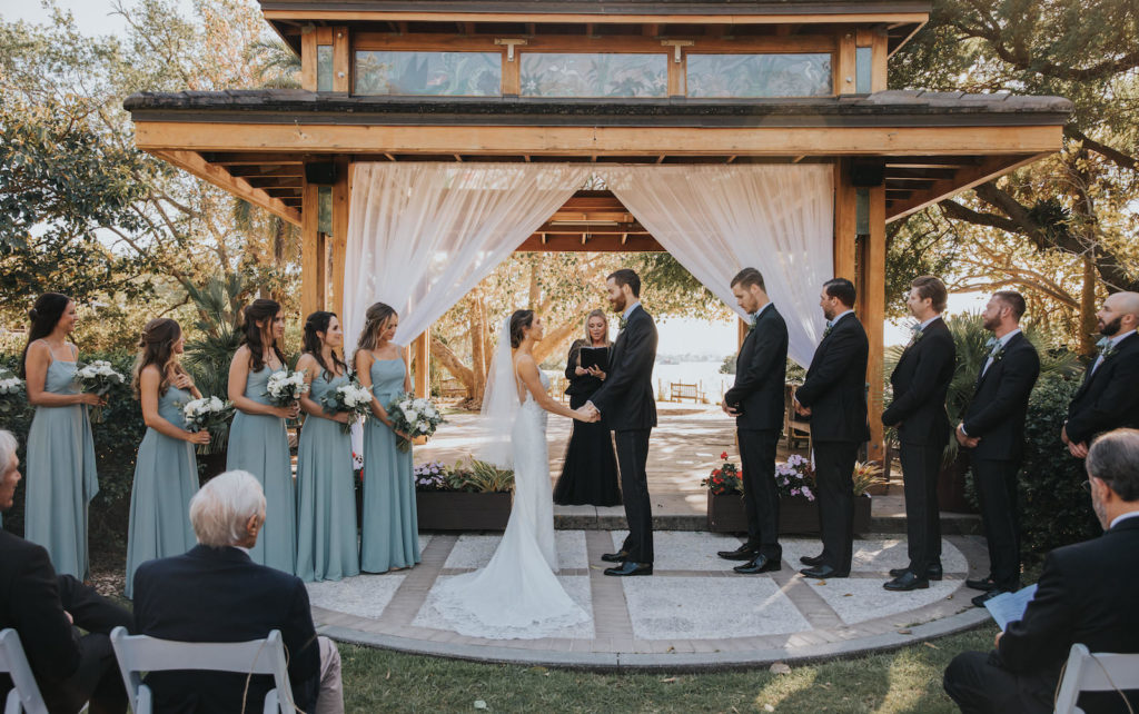Bride and Groom Exchange Vows | Outdoor Botanical Garden Gazebo Wedding Ceremony with Draping | Sarasota Wedding Venue Selby Gardens | Planner Taylored Affairs