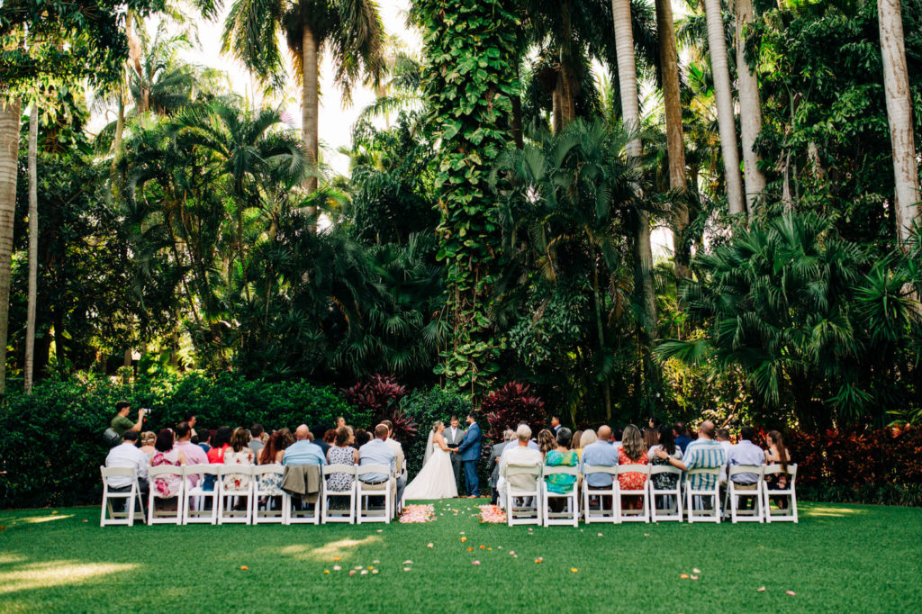 Tropical Florida Garden Wedding Ceremony with White Chairs | St. Petersburg Wedding Venue Sunken Gardens