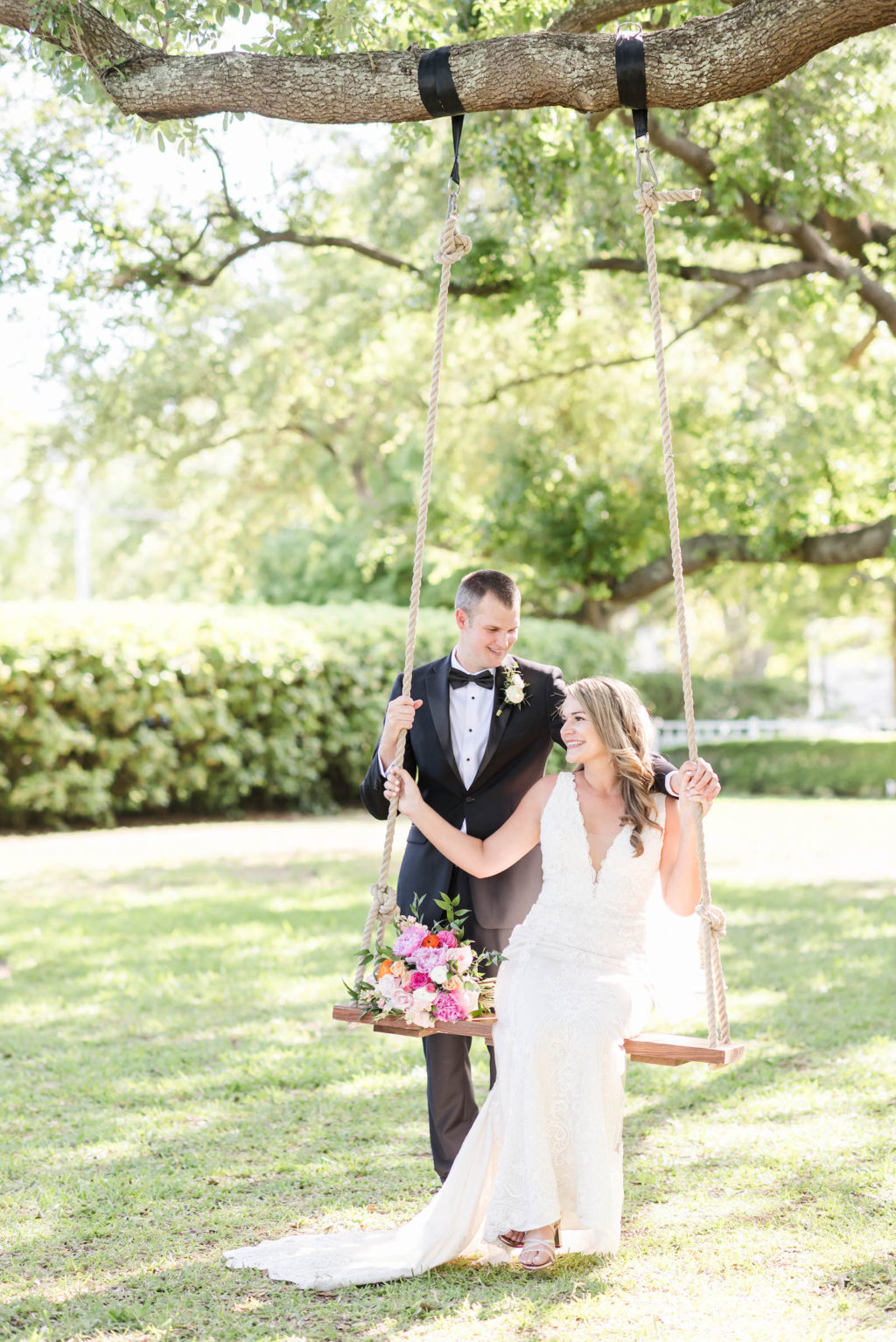Bride and Groom on a Swing During Wedding Portrait Session in Tampa | Katie Hauburger Photography  | Special Moments Event Planning 