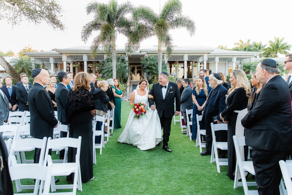 Florida Bride Walking Down the Wedding Ceremony Aisle, Jewish Wedding | Tampa Bay Wedding Outdoor Garden Venue The Resort at Longboat Key Club