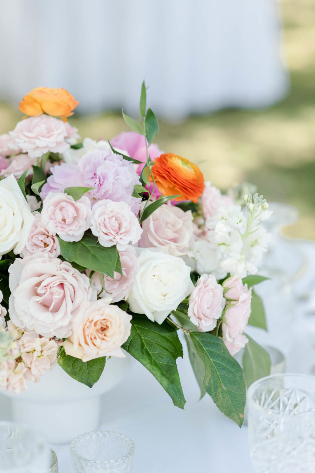 Pastel White and Blush Pink Rose Centerpiece with Greenery and Clear Glass Beaded Wedding Chargers | Romantic Garden Wedding Reception Ideas | Tampa Bay Rental Company Outside the Box Event Rentals