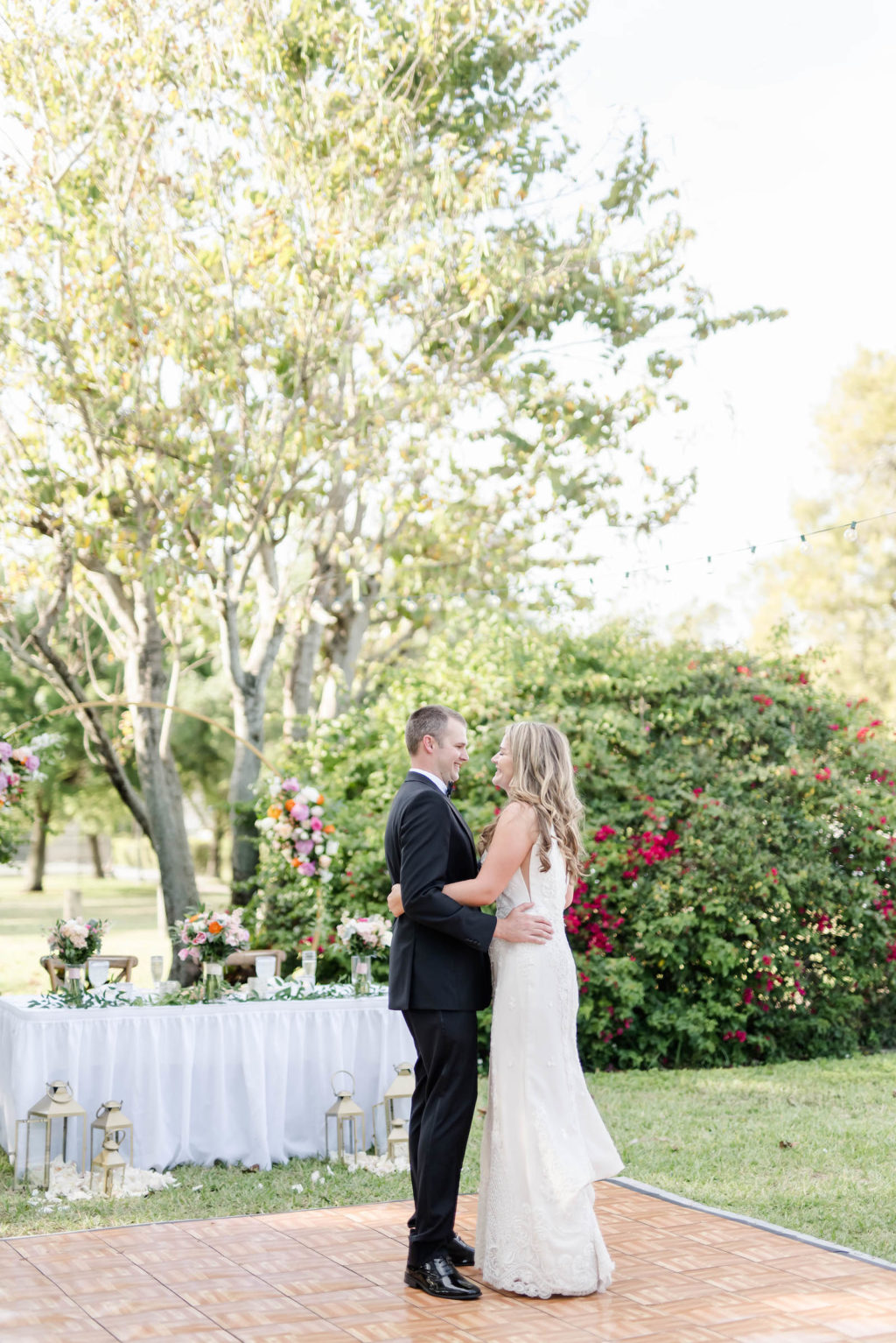 Bride and Groom First Dance Photo | Tampa Bay Wedding DJ Grant Hemond & Associates | Outdoor Garden Venue Davis Islands Garden Club