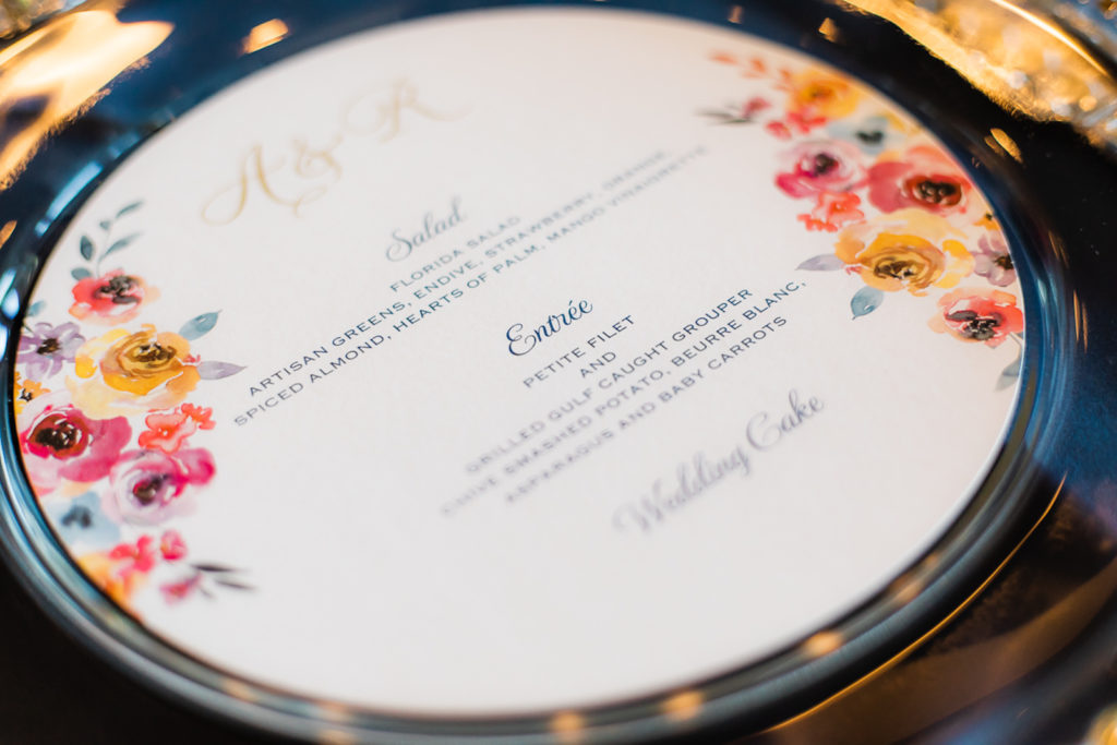 Elegant Wedding Reception Decor, Navy Blue Table Linens, Clear and Gold Beaded Chargers, Round Custom Floral Menus