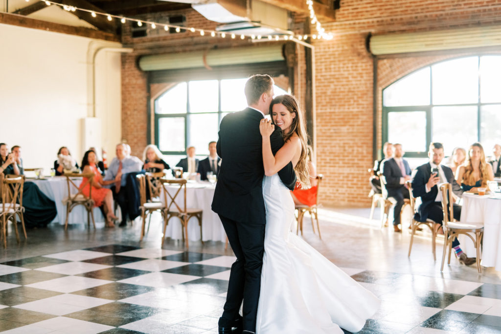 Florida Bride and Groom First Dance During Wedding Reception at St. Pete Wedding Venue Morean Center for Clay | Tampa Bay Wedding Photographer Kera Photography | Wedding Hair and Makeup Femme Akoi Beauty Studio | Wedding DJ Graingertainment