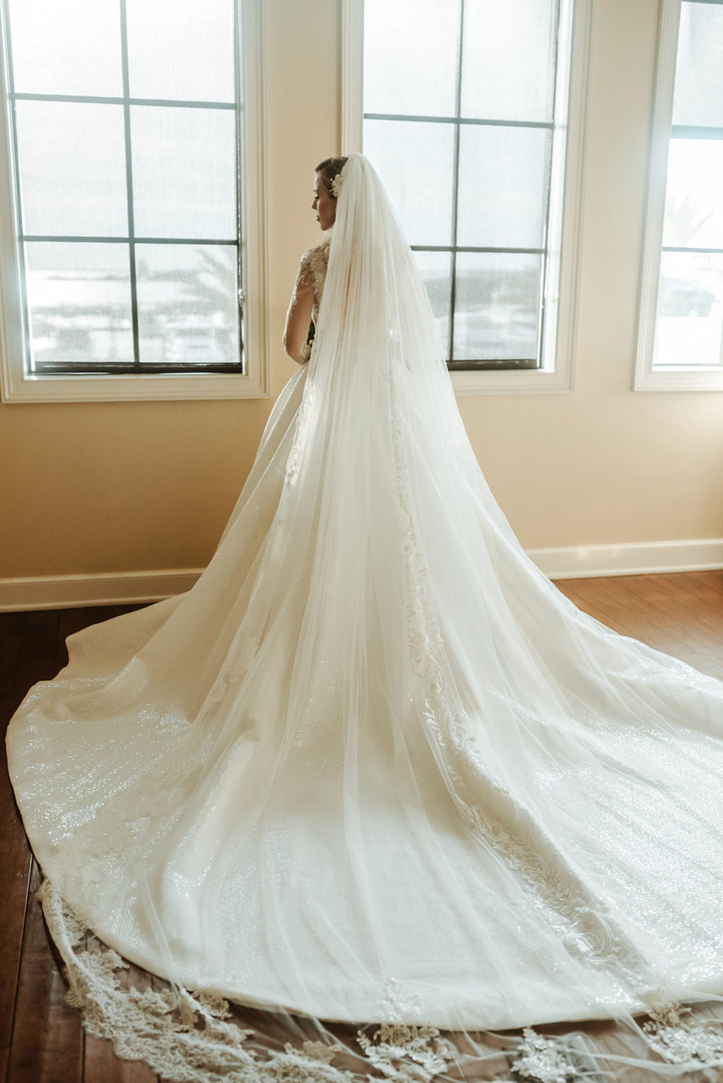 Florida Bride in Glamorous Full Skirt Train and Full Length Lace Veil