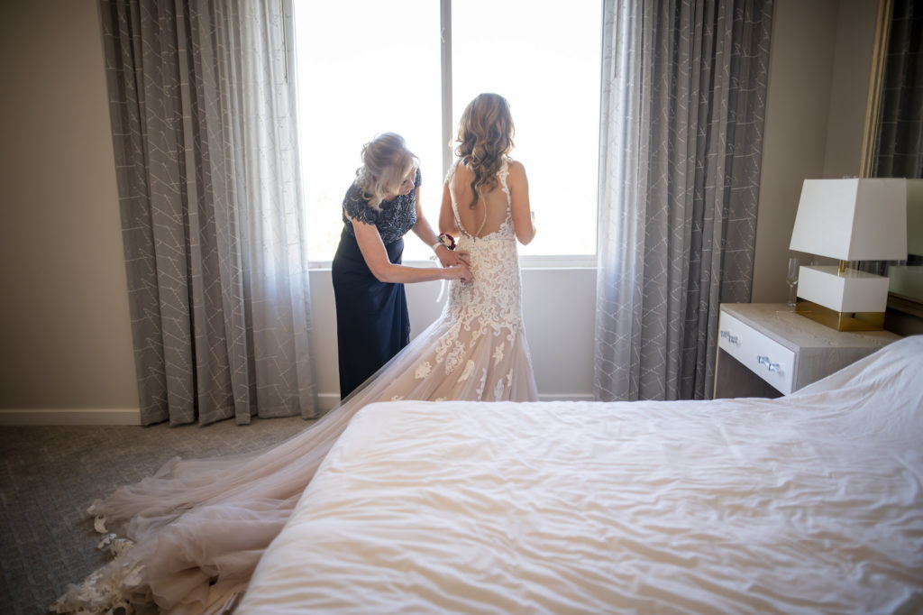 Florida Bride with Mom Helping Button Up Open Key Hole Back Wedding Dress
