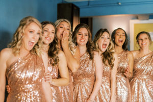 Bridesmaids in Matching Rose Gold Sequin One Shoulder Dresses Reaction to Bride in Wedding Dress | Tampa Bay Wedding Photographer Kera Photography | Wedding Hair and Makeup Femme Akoi Beauty Studio