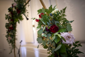 Wedding Ceremony Decor, Gold Round Arch with Greenery, Blush Pink and Burgundy Roses | Tampa Bay Wedding Planner Coastal Coordinating