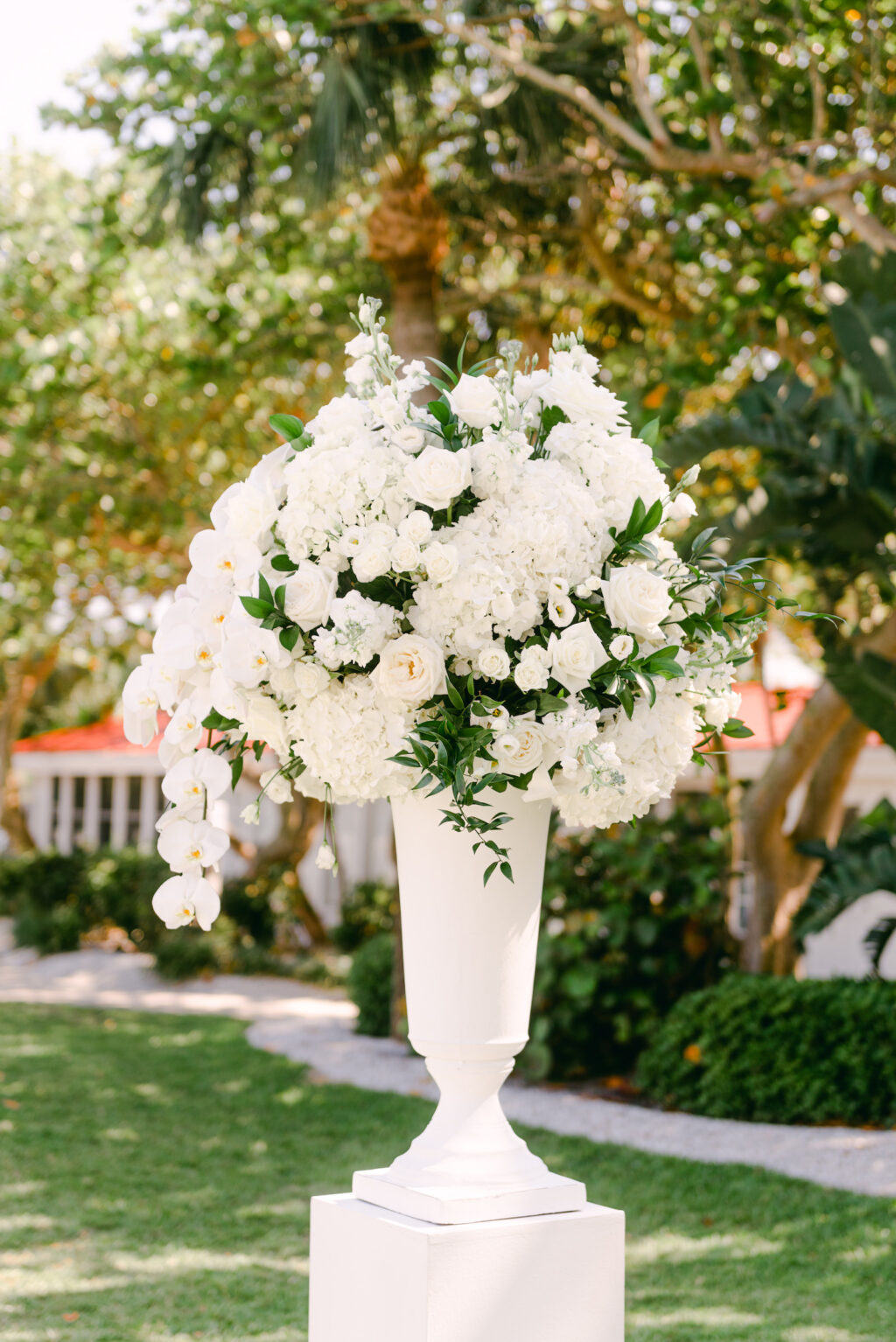 Classic Tampa Bay Outdoor Wedding Ceremony, Tropical Country Club with Umbrella's for Shade, White Floral Arrangements | Carlouel Yacht Club | Florida Wedding Planner Parties A La Carte | Clearwater Florist Bruce Wayne Florals