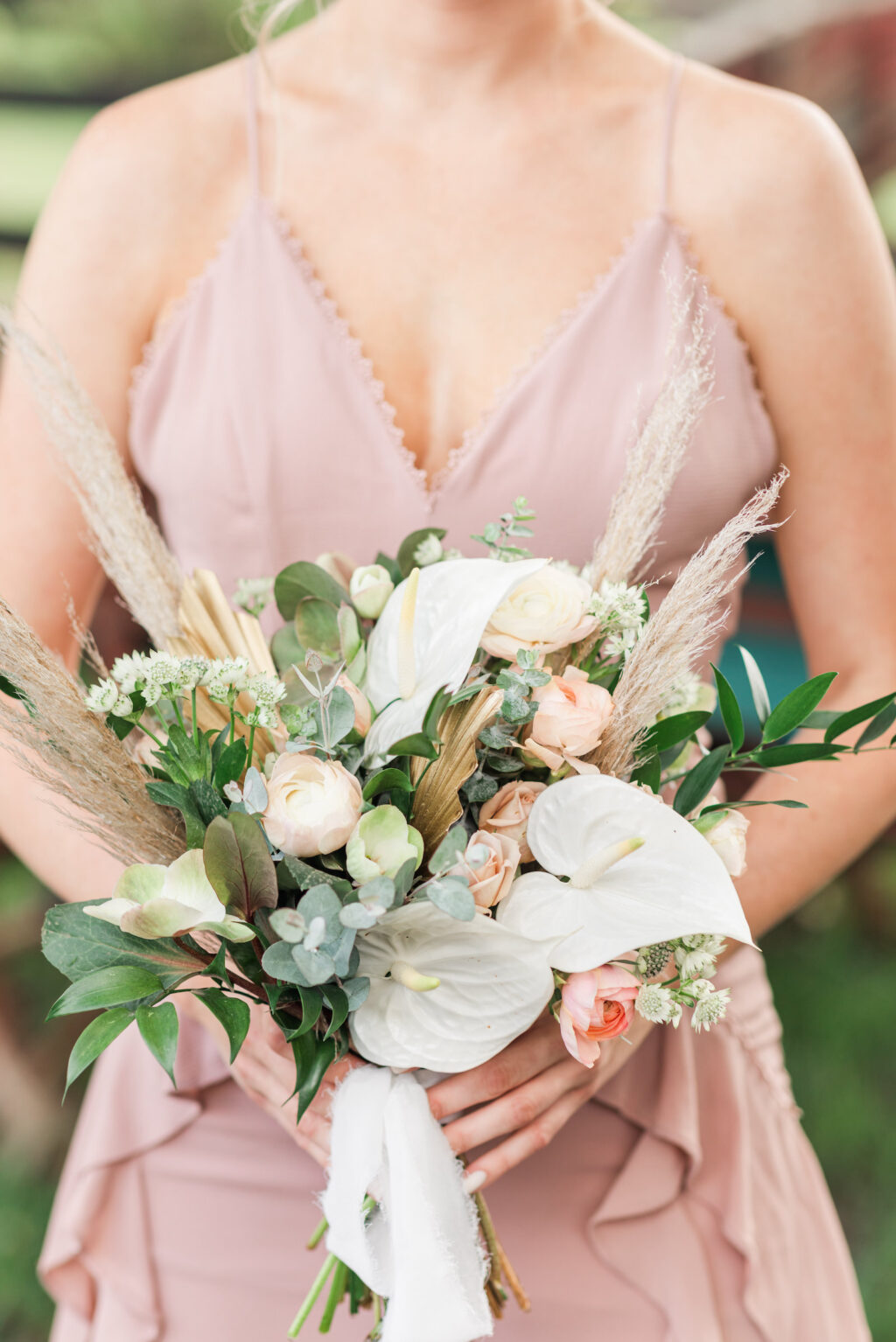 Boho Bridesmaid with Flower Crown Wearing Pink Mauve Ruffle Dress Holding White Calla Lillies, Pampas Grass, Greenery Wild Floral Bouquet | Big Fake Wedding Tampa