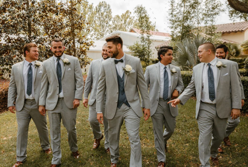 Groom and Groomsmen Portrait | Groomsmen in Gray Suits With White Rose Boutonnière