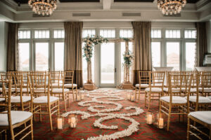 Romantic Indoor Ballroom Wedding Ceremony with Gold Chiavari Chairs | St. Pete Rental Company Gabro Event Services | Venue The Birchwood | Tampa Bay Planner Perfecting the Plan