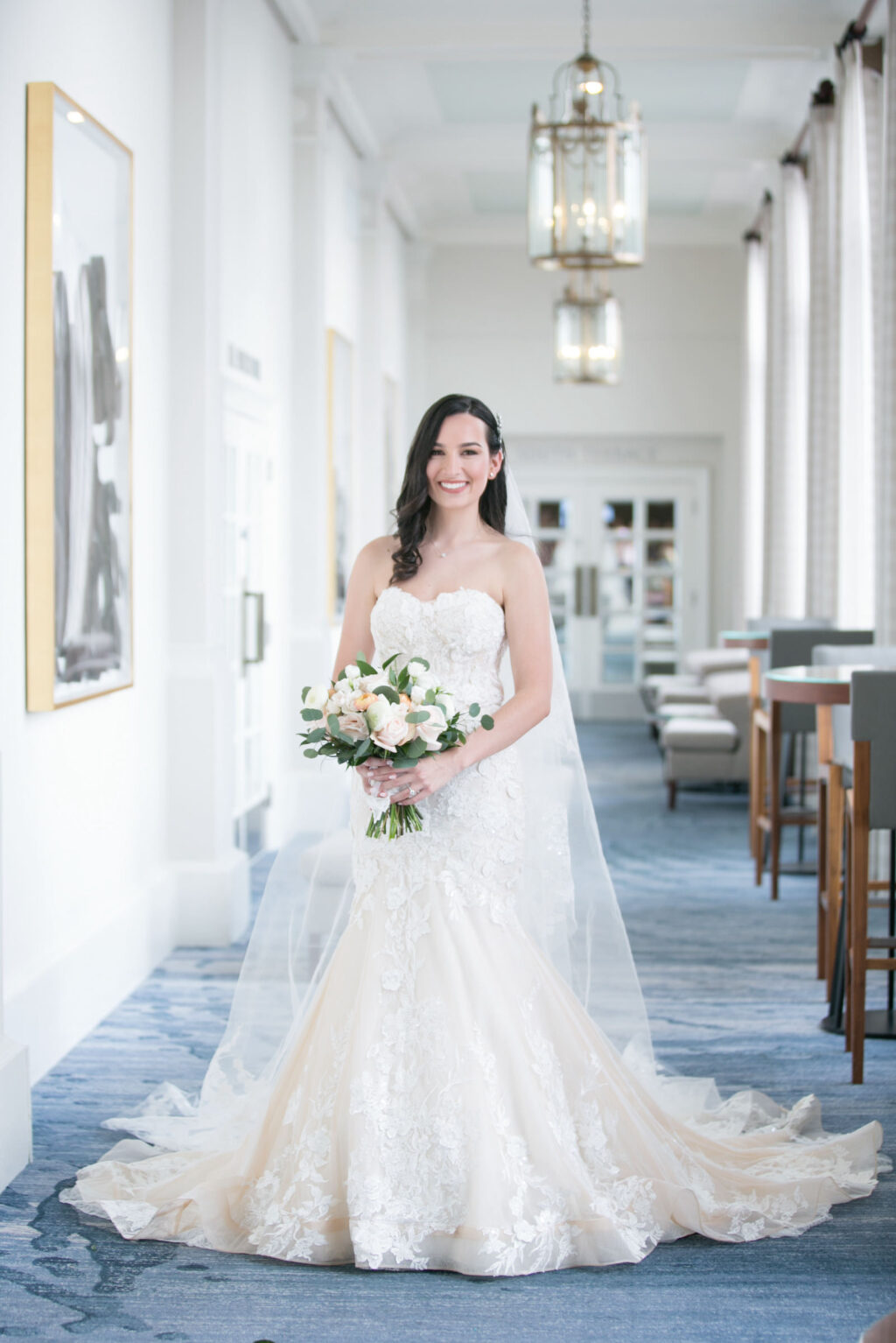Bride in Fit and Flare Wedding Dress with Lace Detail and Long Train Veil | Winnie Couture | St. Pete Wedding Photographer Carrie Wildes Photography