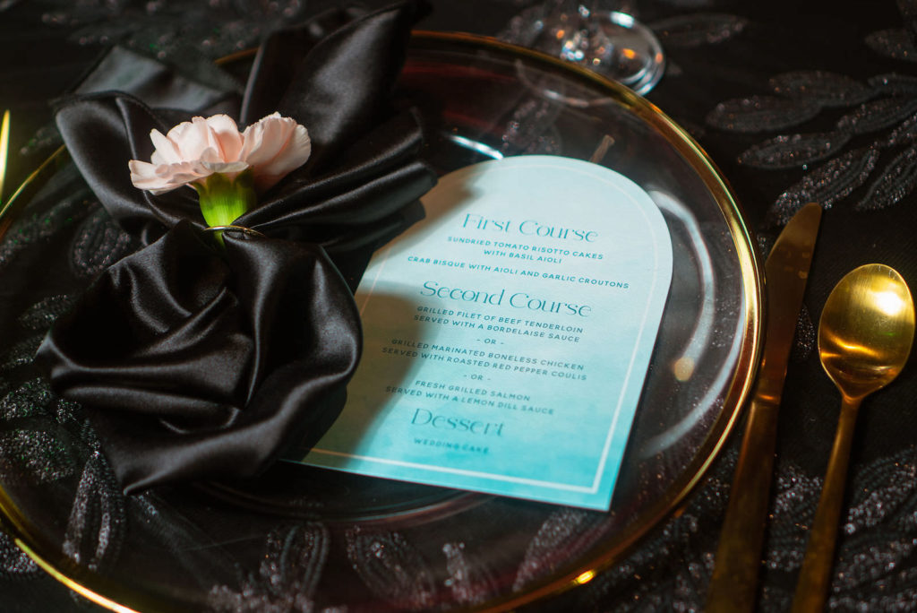 Modern Florida Wedding Reception Decor, Black Textured Specialty Tablecloth, Satin Linens, Gold Flatware, Teal Menu Stationery