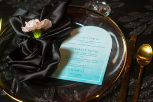 Modern Florida Wedding Reception Decor, Black Textured Specialty Tablecloth, Satin Linens, Gold Flatware, Teal Menu Stationery