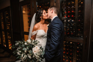 Bride and Groom Intimate Kiss Portrait in Wine Cellar | St. Pete Wedding Venue The Birchwood