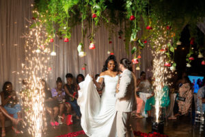 Modern Florida Bride and Groom First Dance Under Suspended Florals, Cold Sparklers | Tampa Bay Event Venue 7th and Grove