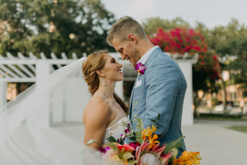 Boho Tropical Bride and Groom Veil Blowing in Wind Portrait | Tampa Bay Wedding Photographer Amber McWhorter Photography | Wedding Hair and Makeup Femme Akoi Beauty Studio