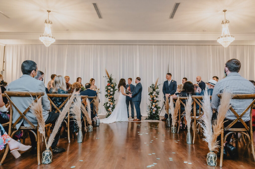 Tampa Couple Exchanges Wedding Vows at Indoor Florida Ceremony | Tampa Bay Wedding Photographer and Videographer Iyrus Weddings | Venue The Orlo