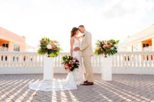 Florida Bride and Groom Tropical Waterfront Rooftop Wedding Ceremony Hyatt Regency Clearwater Beach