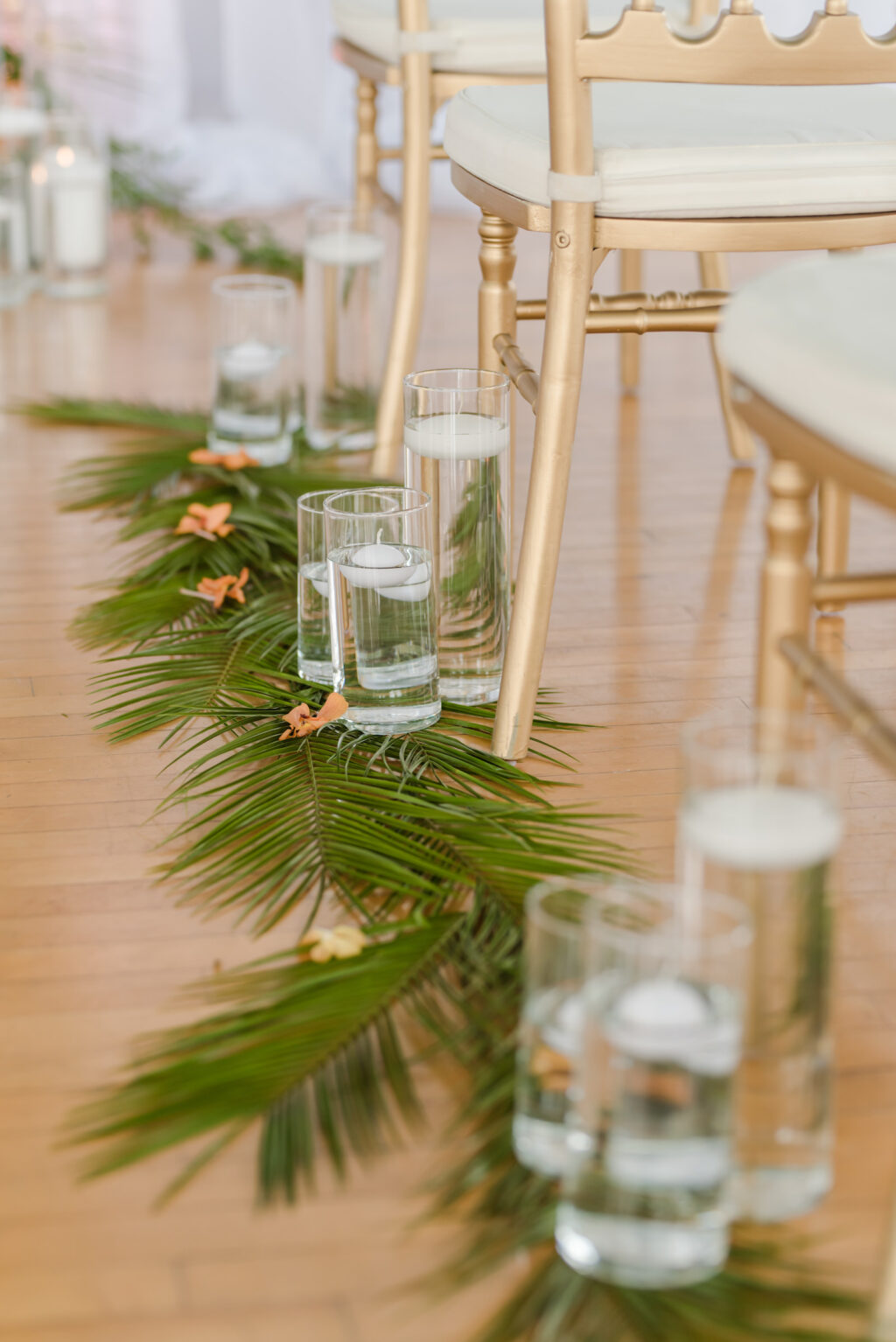 Tropical Wedding Ceremony Decor, Floating Candles, Palm Fronds Lining Aisle | Tampa Bay Wedding Planner Eventfull Weddings