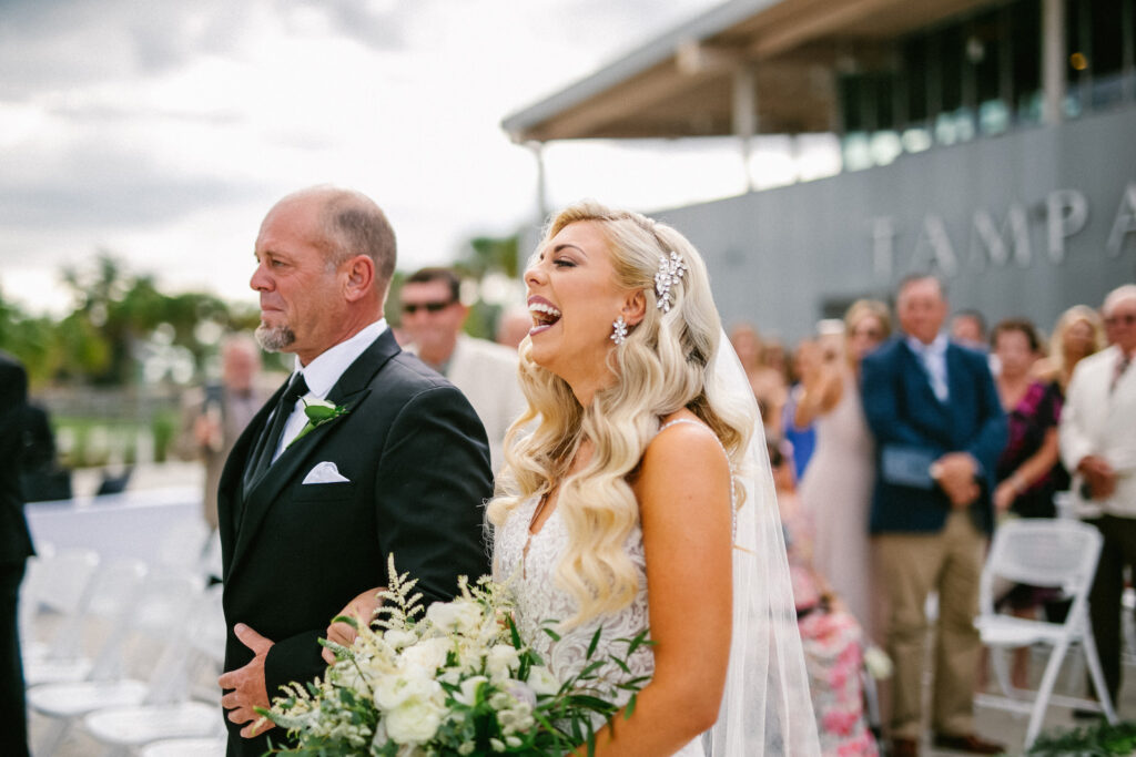 Florida Bride's Happy Reaction to Seeing Groom Walking Down the Wedding Ceremony Aisle | Tampa Bay Wedding Hair and Makeup Femme Akoi Beauty Studio