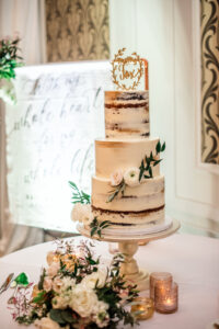 Semi Naked Three Tier Wedding Cake with Laser Cut Gold Last Name Cake Topper | St. Pete Baker The Artistic Whisk