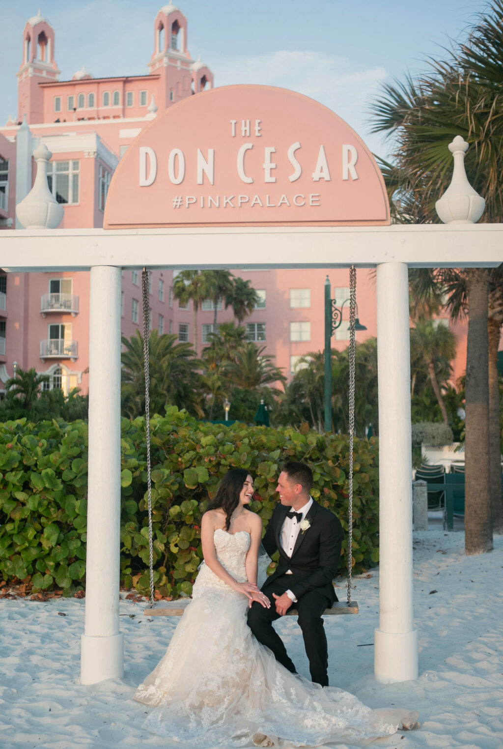 Bride and Groom Beach Swing Portrait | St. Pete Wedding Venue The Don CeSar | Photographer Carrie Wildes Photography