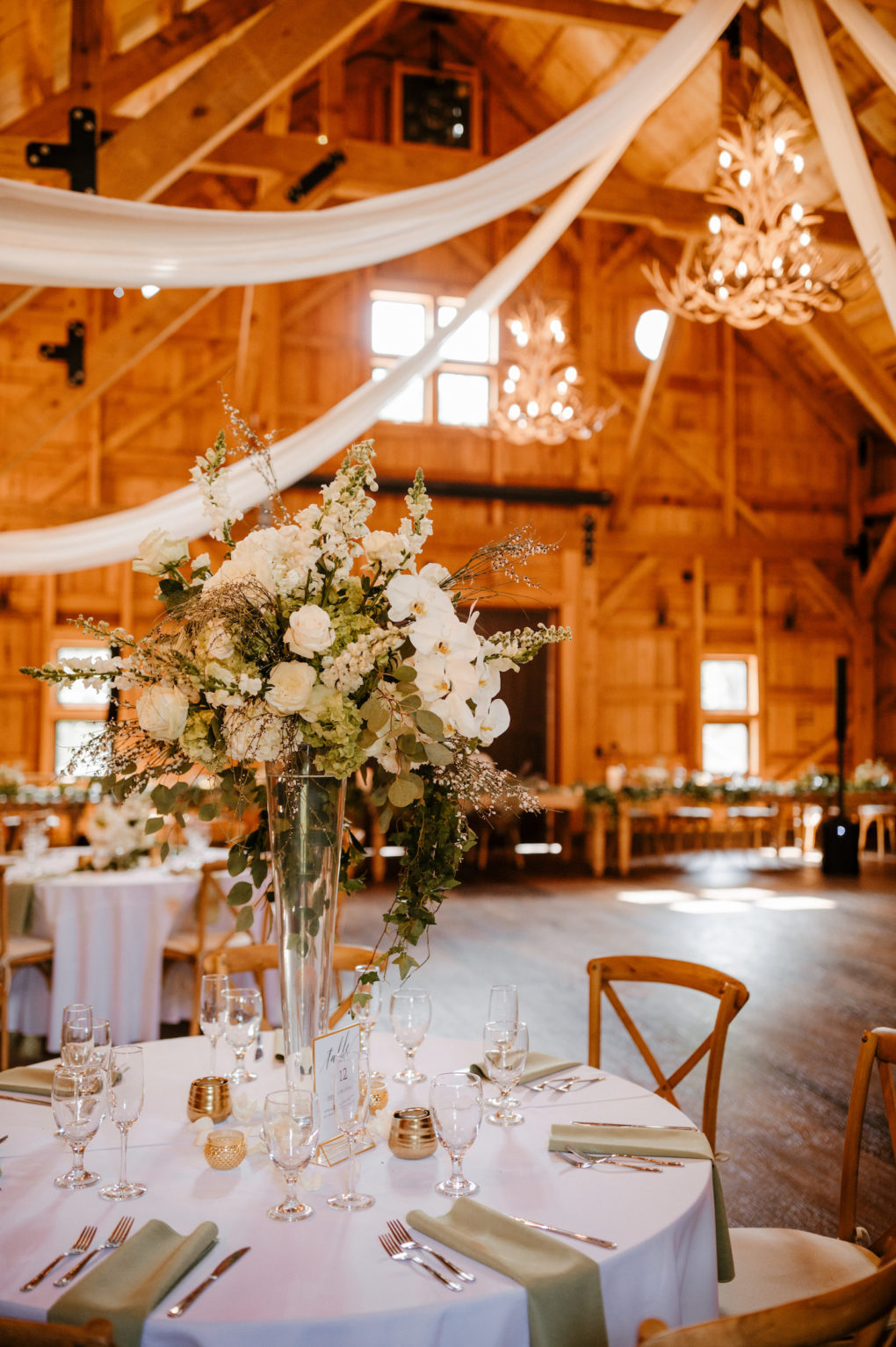 Florida Barn Wedding Reception with Rustic Décor and Tall Floral Centerpieces | Tampa Bay Wedding Reception Venue | Mision Lago Estate