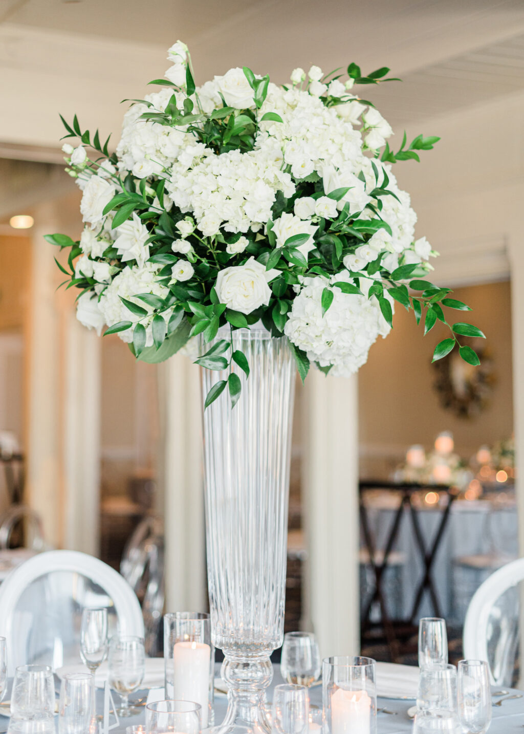 Elegant Light Blue and White Clearwater Wedding with White and Clear Ghost Chairs | Clearwater Beach Wedding Planner Parties A'La Carte | Clearwater Wedding Florist Bruce Wayne Florals | Carlouel Yacht Club