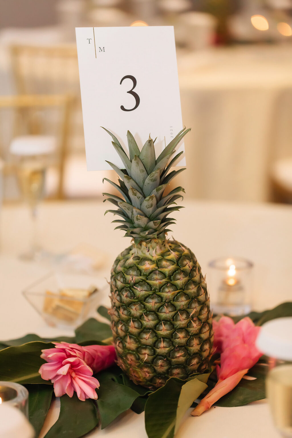Tropical Wedding Reception Decor, Pineapple and Pink Ginger Centerpiece | Tampa Bay Wedding Photographer Limelight Photography