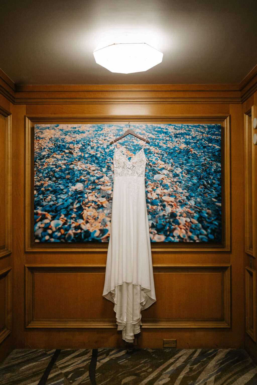 Wedding Dress Hanger Shot | Sheath Satin Charmeuse V Neck Lace Bodice Spaghetti Strap Bridal Gown on Hotel Wall Art