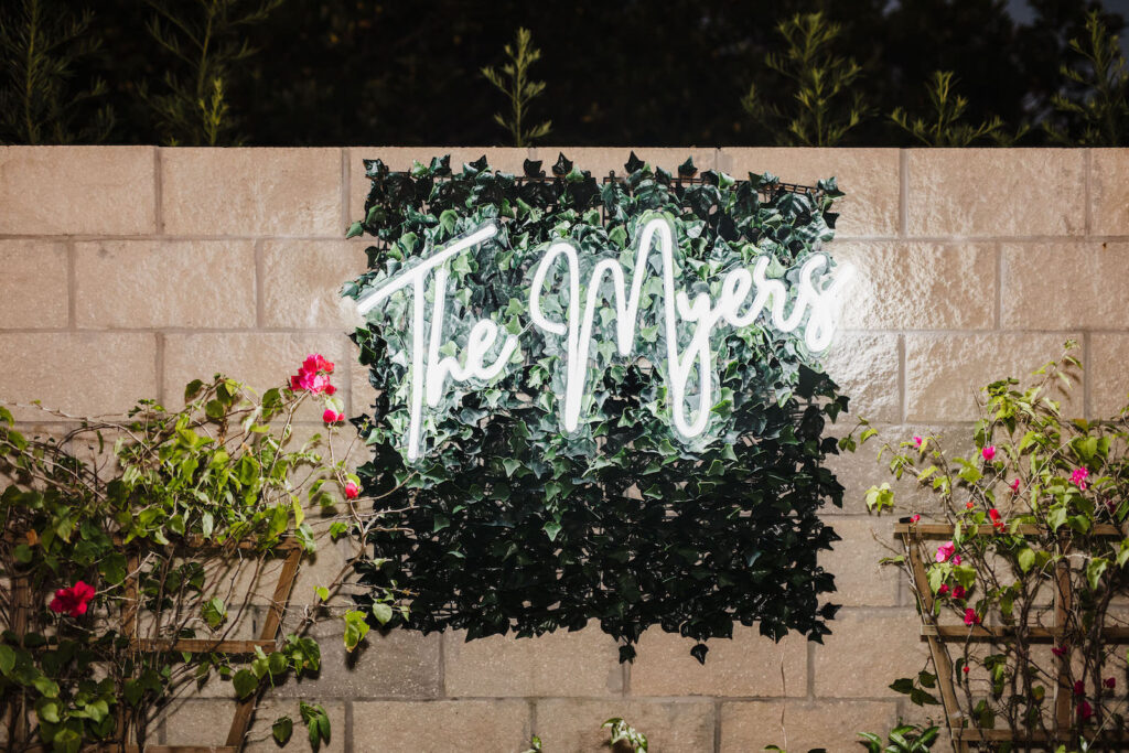 Last Name Personalized Wedding Neon Sign with Greenery Backdrop | Wedding Reception Décor Ideas