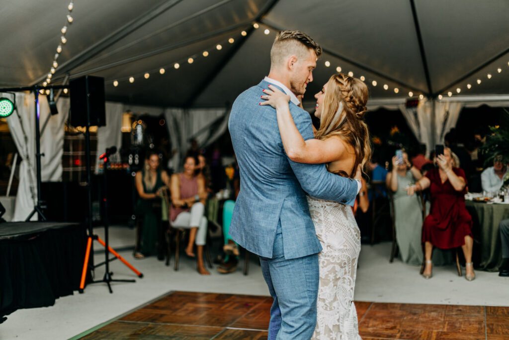 Boho Tropical Bride and Groom First Dance Tent Wedding Reception Photo | Tampa Bay Wedding Photographer Amber McWhorter Photography | Wedding Hair and Makeup Femme Akoi Beauty Studio