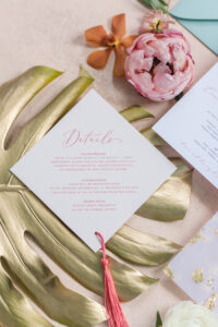 White and Pink Font Wedding Stationery with Coral Pink Tassel