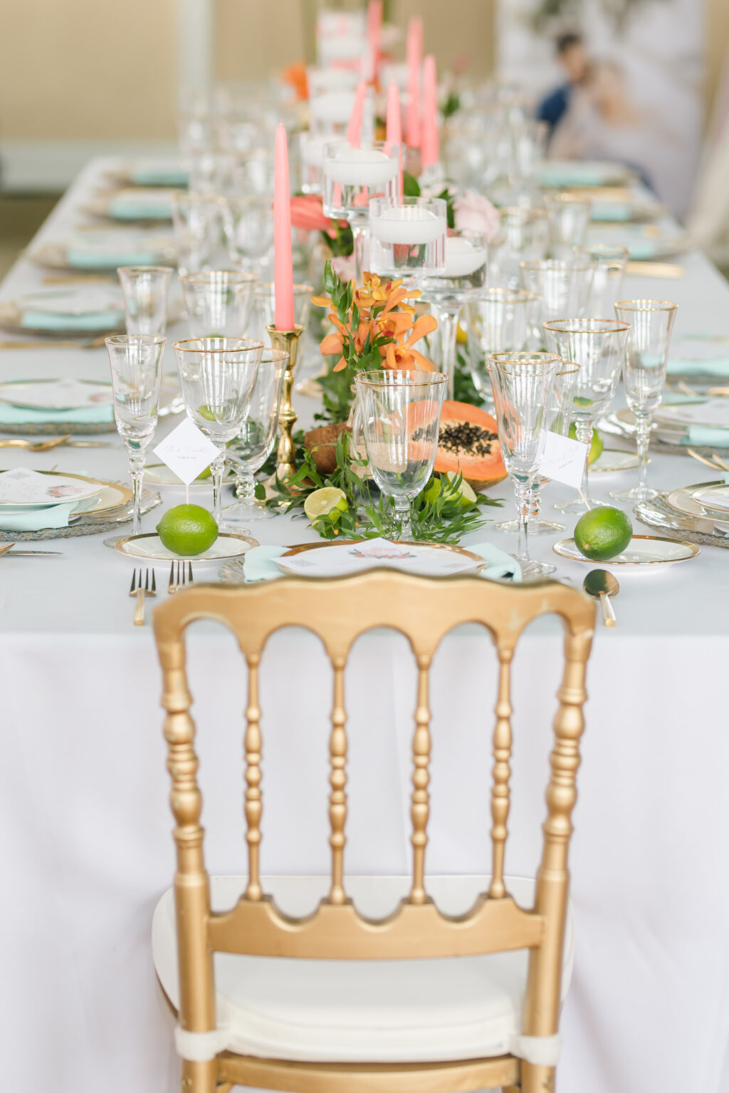 Old Havana Cuba Wedding Reception Decor, White Linen Long Table with Pink Candlesticks, Tropical Fruit Papaya, Limes, Greenery Garland, Vintage Gold Chairs | Tampa Bay Wedding Planner Eventfull Weddings | Wedding Rentals Gabro Event Services, A Chair Affair