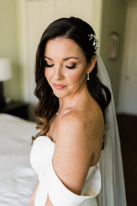 Classic Florida Wedding Attire, Tampa Bay Bride Wearing Stella York White Off the Should Wedding Dress with Crystal Hair Accessory and Pearl Teardrop Earrings