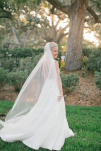 Elegant BHLDN White Wedding Dress with Long Train and Veil | Classic Updo with Simple and Natural Makeup | Tampa Hair and Makeup Artist Femme Akoi Beauty Studio