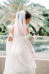 Bride in Off the Shoulder Fitted Wedding Dress | Long White Wedding Veil