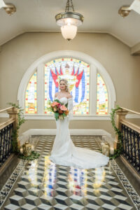 Florida Bride Wearing Vintage Strapless Wedding Dress with Fringe Off the Shoulder Sleeves Holding Colorful Floral Bouquet | Historic Tampa Wedding Venue The Cuban Club