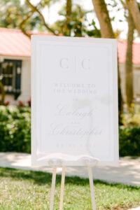 Classic Wedding Ceremony Decor, Welcome Sign to Tampa Bay Outdoor Reception, White with Slate Blue Detailing in Modern Font | Florida Wedding Planner Parties A La Carte