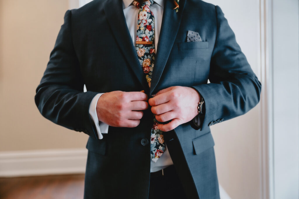 Groom Floral Tie and Navy Blue Suit
