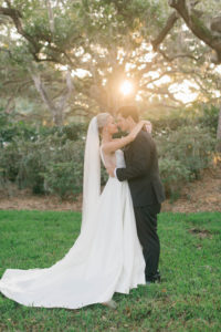 Bride and Groom Wedding Portrait | Bride in BHLDN Illusion Back Wedding Ballgown Dress with Classic Updo and Natural Makeup | South Tampa Hair and Makeup Artist Femme Akoi Beauty Studio