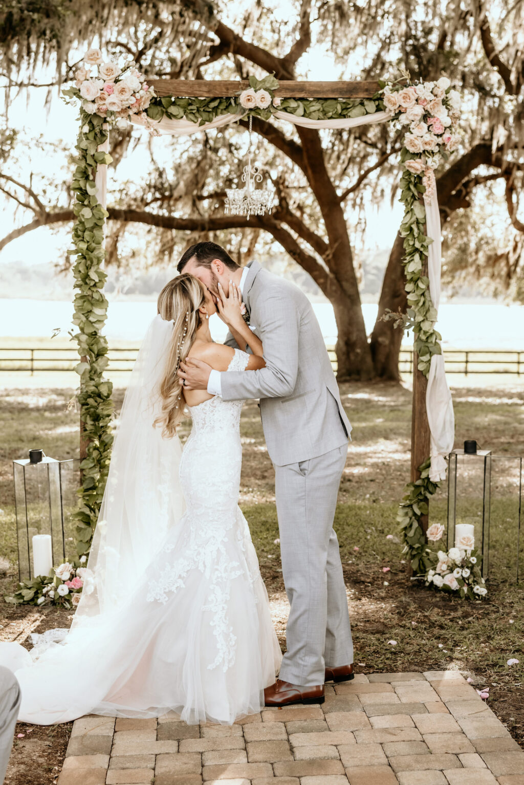 Bride and Groom First Kiss Wedding Portrait | Covington Farms Rustic Florida Wedding Venue